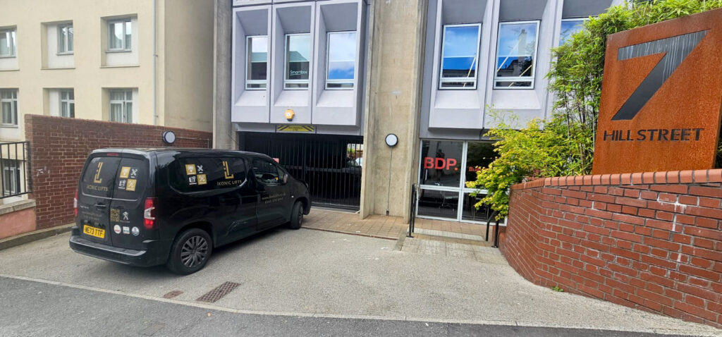 ikonic van ikonic lifts van at a clients building
